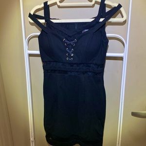 Stylish club dress by an. Color is black and size is a small medium.